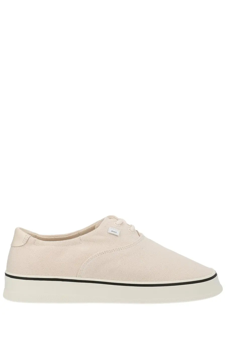 Ami Paris unisex tennis sneaker white cream canvas low-top with black rubber sole and stitching details