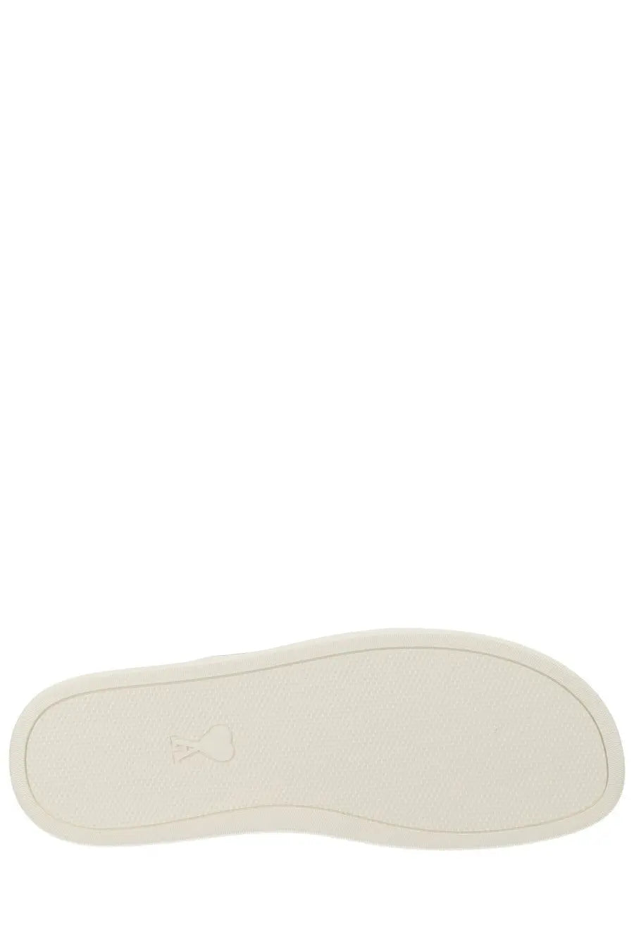 Off-white rubber sole with subtle embossed logo on ami paris unisex tennis sneaker white back side