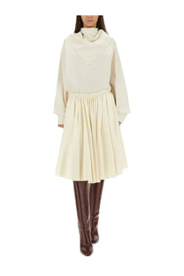 Ami Paris women’s cream-colored long-sleeved turtleneck dress with pleated skirt and elastic waistband