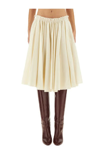Cream-colored pleated midi skirt with elastic waistband by Ami Paris in beige perfect for casual or office wear