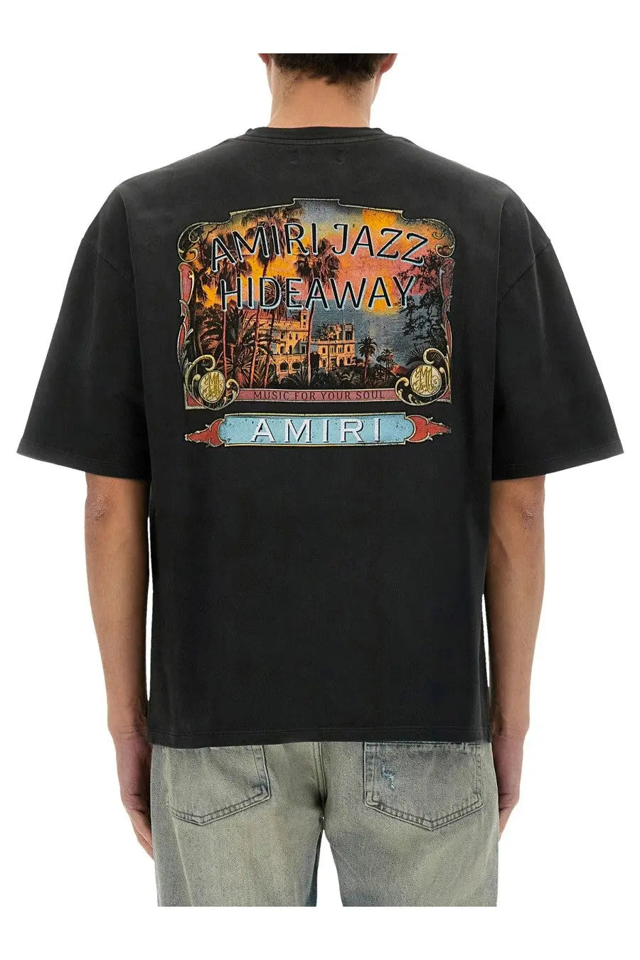 Amiri men’s black jazz hideaway t-shirt with vibrant vintage tropical hideaway graphic print and palm trees