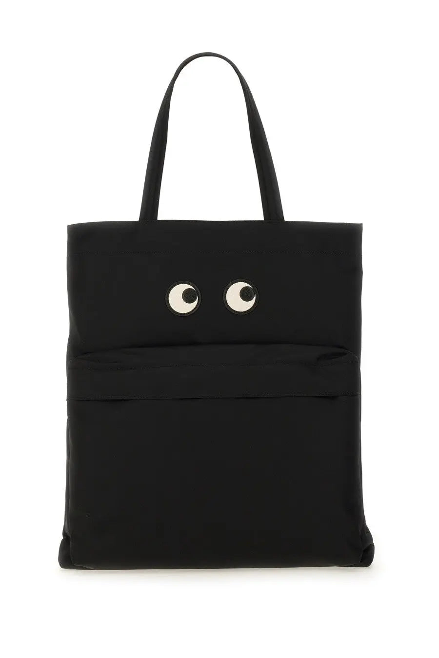 Anya Hindmarch women’s black tote bag featuring playful white and black embroidered eyes on the front
