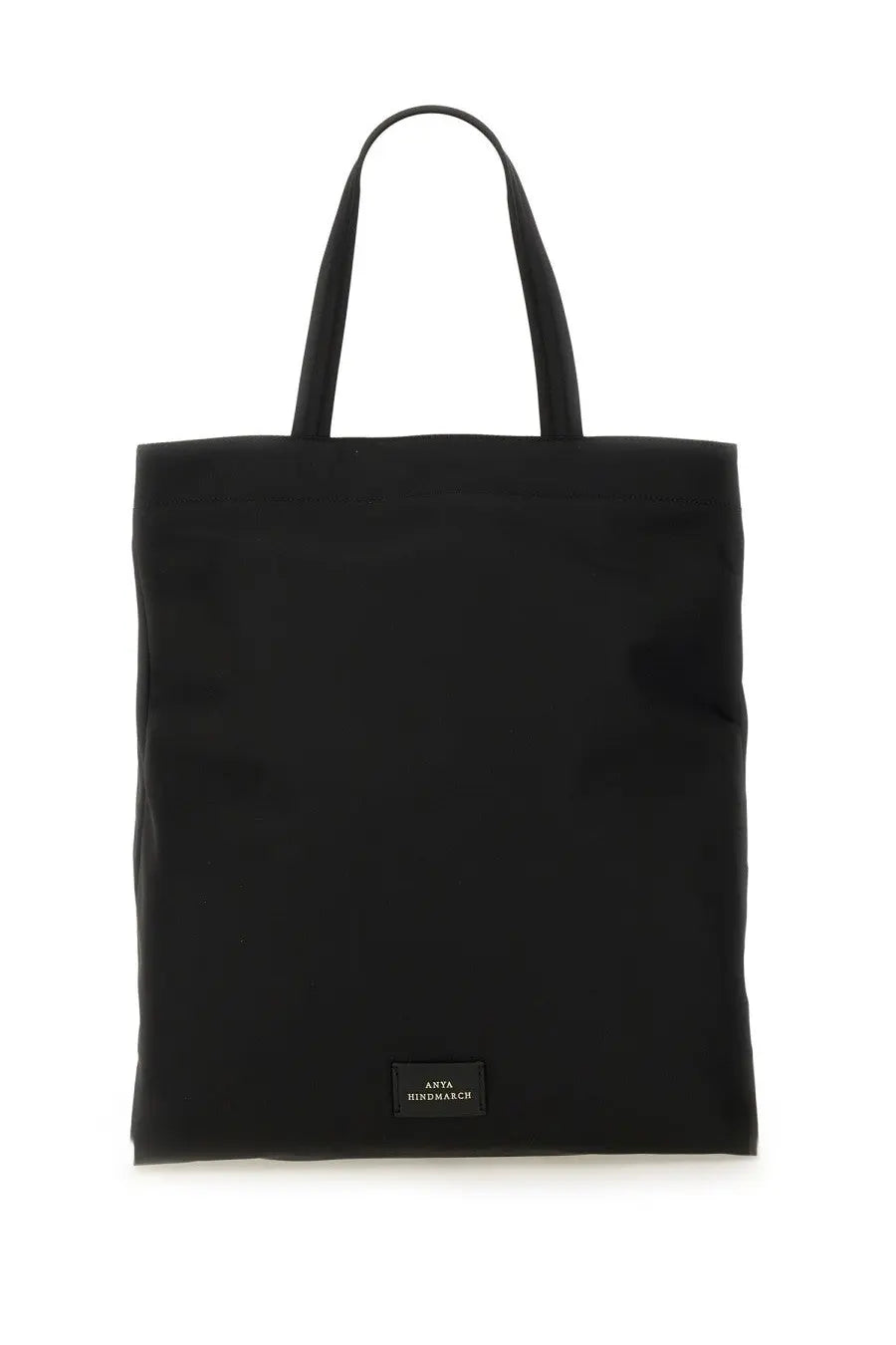 Anya Hindmarch women’s borsa tote black canvas bag with two handles and small rectangular label at the bottom