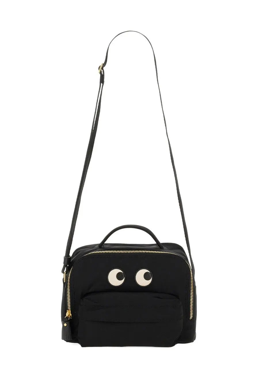 Anya Hindmarch women’s black canvas shoulder bag with playful white embroidered eyes and gold-tone zippers