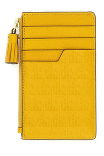 Anya Hindmarch women’s portacarte coco pops yellow leather cardholder with embossed pattern and tassel zipper pull