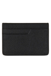 Anya Hindmarch women’s portacarte eyes black textured card holder with subtle grainy finish and minimalist design