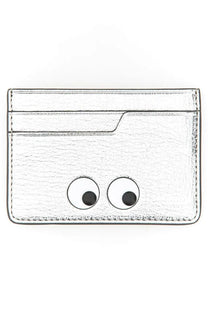 Anya Hindmarch women’s portacarte eyes silver textured card holder with playful black and white googly eyes