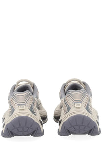 A pair of beige and gray balenciaga triple s sneakers with chunky textured sole in ash women’s dragon sneaker grey design