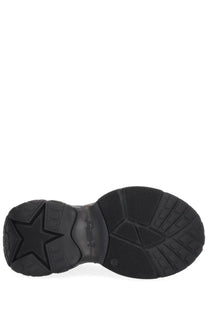 Black rubber sole with star-shaped tread pattern and embossed ash branding on ash women’s drake sneaker black