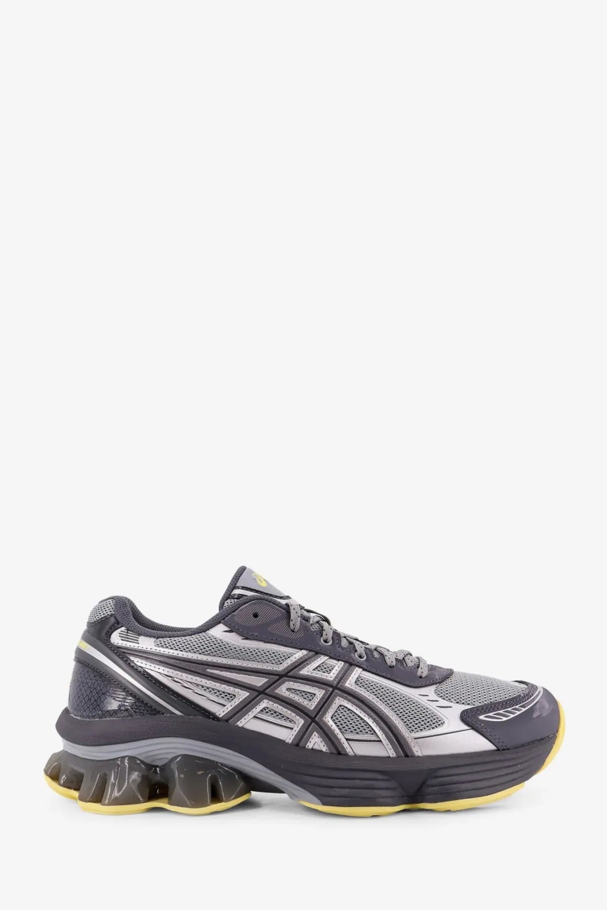 Asics men’s gel kinetic mesh sneakers in gray and silver with textured mesh upper black stripes and yellow chunky sole