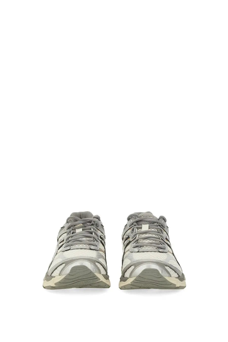 Asics unisex gel cumulus sneaker in gray and beige with suede and mesh materials and a classic retro design