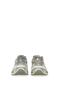 Asics unisex gel cumulus sneaker in gray and beige with suede and mesh materials and a classic retro design