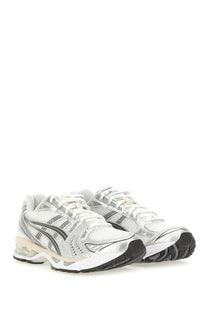 Asics unisex gel kayano sneaker in silver and black with mesh upper reflective accents and cushioned sole