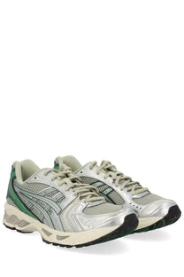 Asics unisex gel kayano sneaker in silver and green with mesh upper metallic accents and black rubber sole