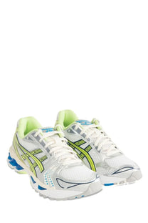 Asics unisex gel kayano running shoes in white neon green with blue accents designed for performance and comfort