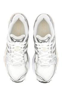 Asics unisex gel kayano sneaker in white and silver with mesh uppers and sleek modern design