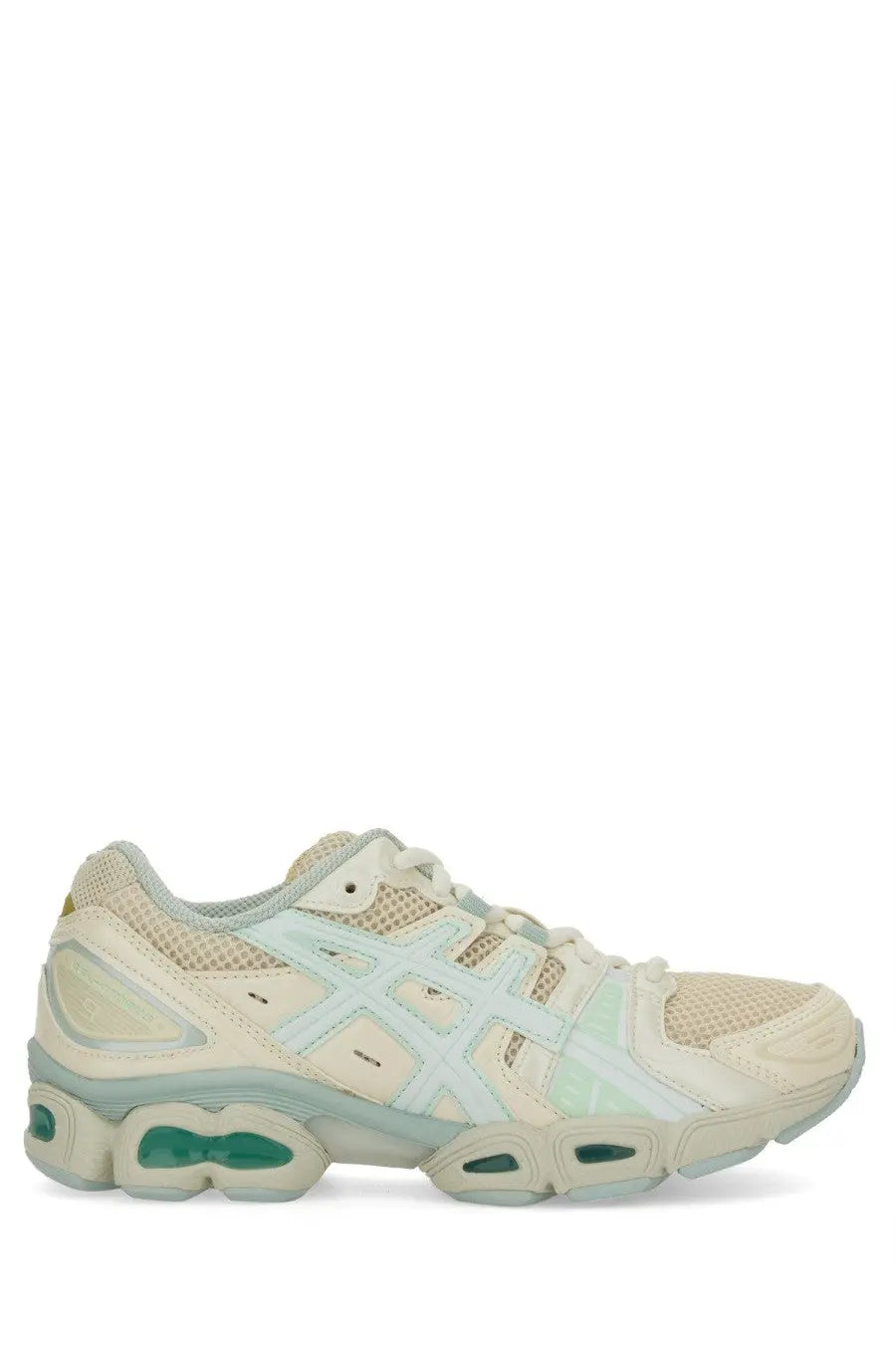 Cream-colored asics unisex gel nimbus sneaker with translucent mint green accents and chunky layered sole