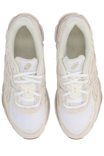 Cream-colored asics gel-kayano 17 sneakers with white mesh and laces featuring a chunky midsole design