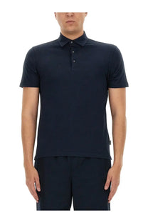 A sleek navy blue cotton polo shirt for men by ASPESI with short sleeves and a classic buttoned collar