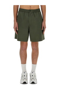 Olive green cotton aspesi men’s nemo bermuda shorts with drawstring waistband and side pockets for casual wear