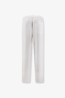 Back view of aspesi men’s ventura white linen trousers with relaxed fit and single back pocket