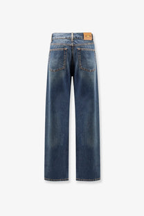 Back side of aspesi women’s blue denim five pockets jeans with faded wash and classic pockets design
