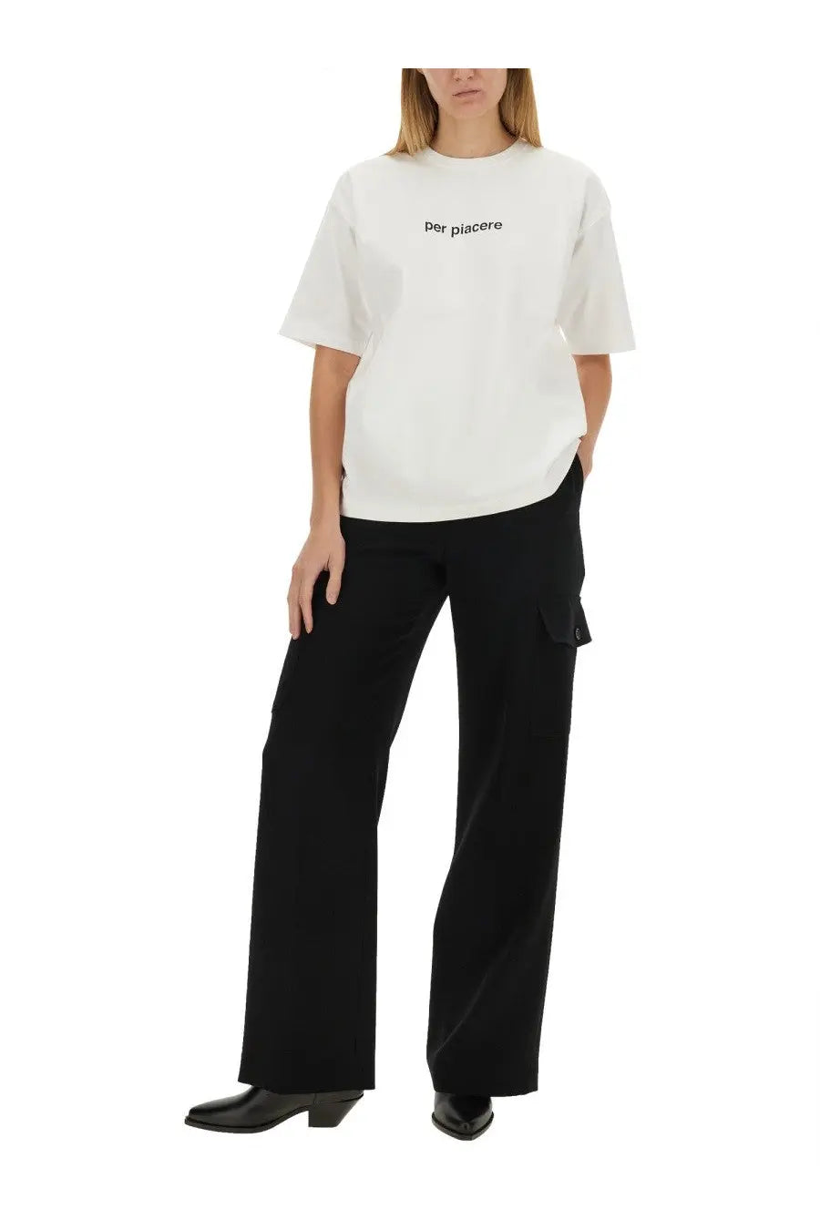 White short-sleeved t-shirt with per piacere printed in black text paired with aspesi women’s black pants
