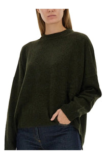 Olive green oversized wool knit sweater from ASPESI womens wool jersey green collection showing front view