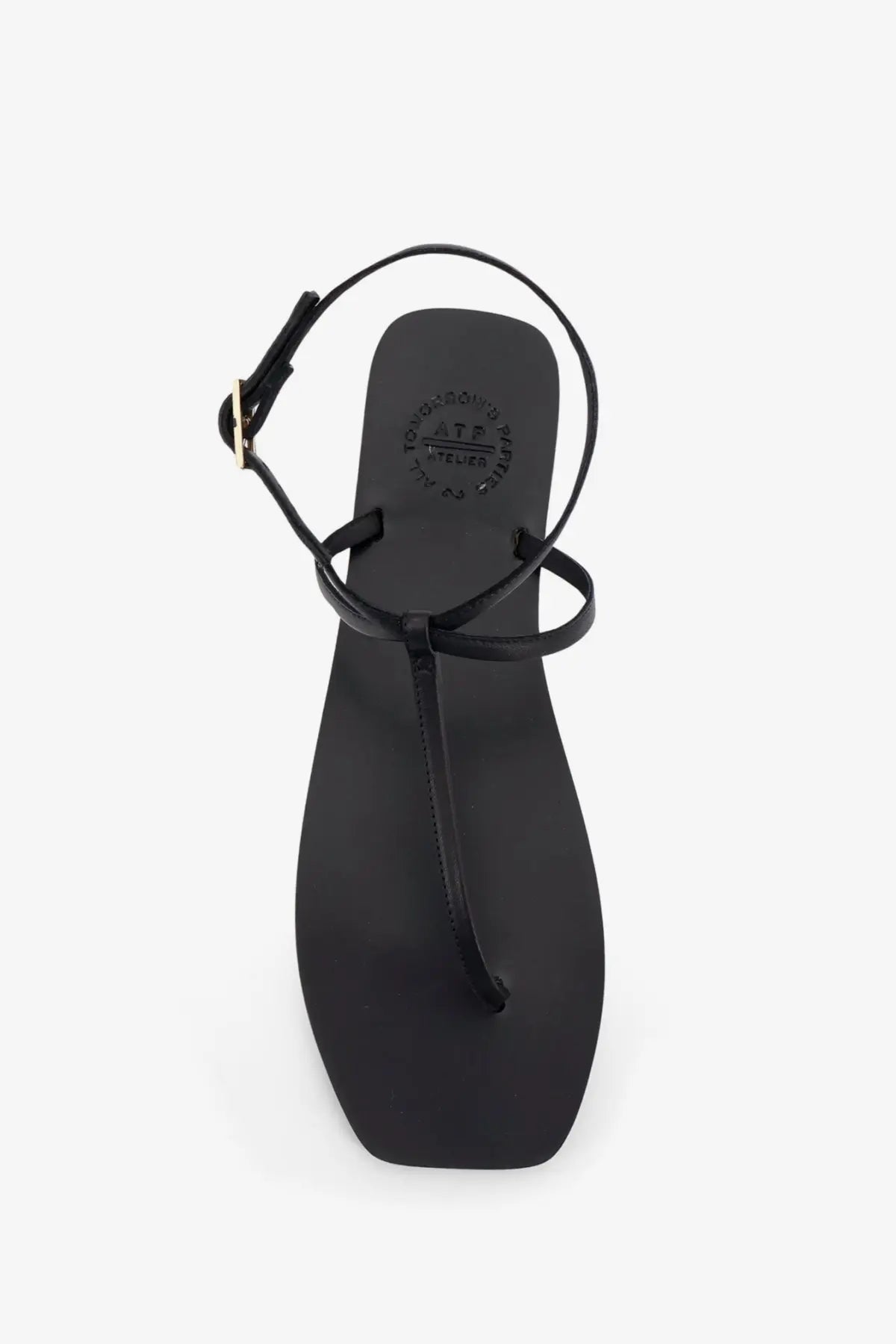 Black leather thong sandal with minimalist design and adjustable ankle strap from ATP Atelier women’s Alassio collection