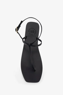 Black leather thong sandal with minimalist design and adjustable ankle strap from ATP Atelier women’s Alassio collection