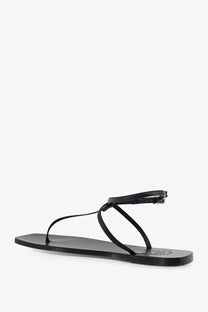 Atp Atelier women’s alassio black leather thong sandal with minimalist design and small metallic ankle buckle