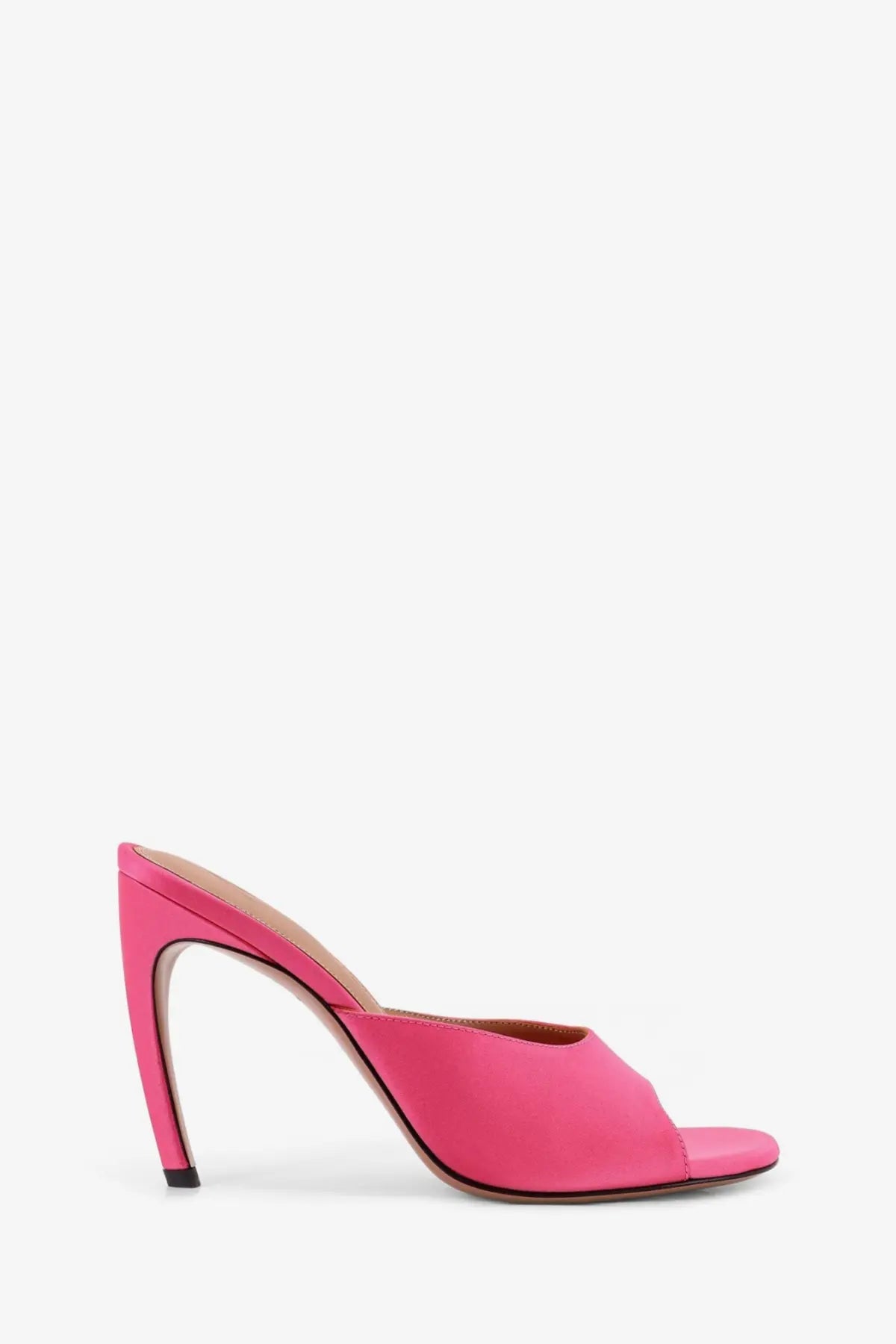 A vibrant pink satin mule heel with a sleek sculpted stiletto design from The Attico Betta sandals