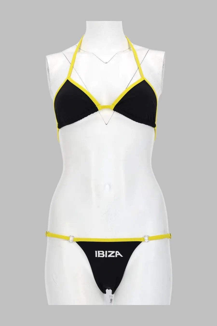 The attico women’s black and yellow halter top bikini set with ibiza branding on the thong back view