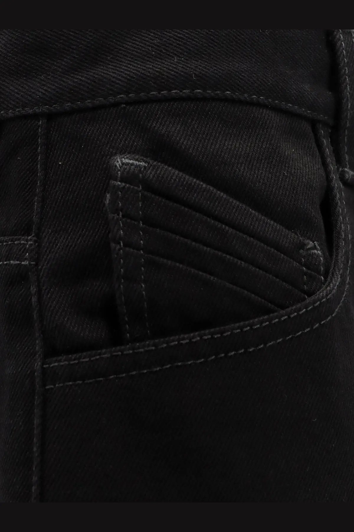The attico women’s black denim trousers showing back pocket with reinforced stitching and subtle texture detail