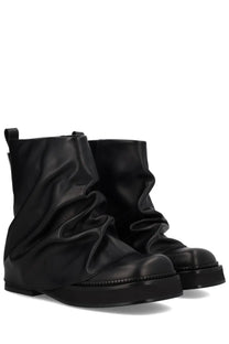 The Attico women’s black leather combat mini robin boot with crinkled draped upper and thick platform sole