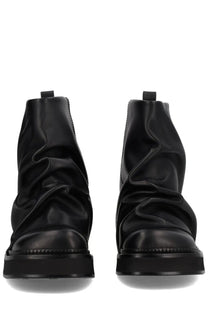 The attico women’s boot combat mini robin black black leather chelsea boots with glossy finish and crinkled texture