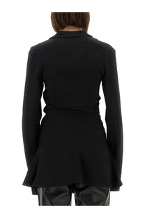 Black tailored blazer with flared hem and long sleeves made from cady material by the attico women’s collection