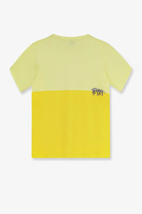 The attico women’s cotton shirt gold is a two-tone yellow t-shirt with pastel upper and mustard lower halves and a black logo