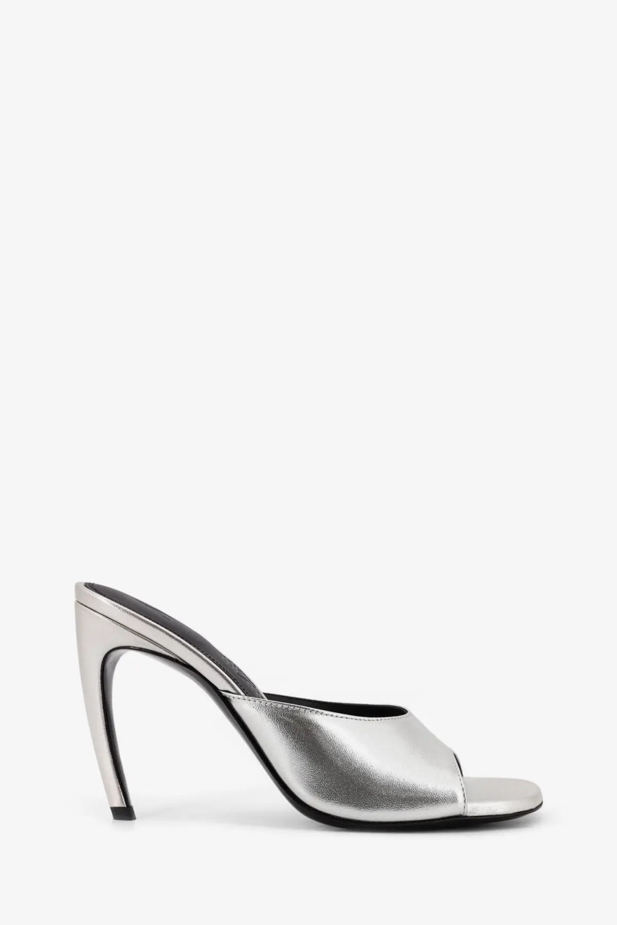 The attico women’s laminated leather betta sandals in silver feature a sleek metallic mule heel with a black insole