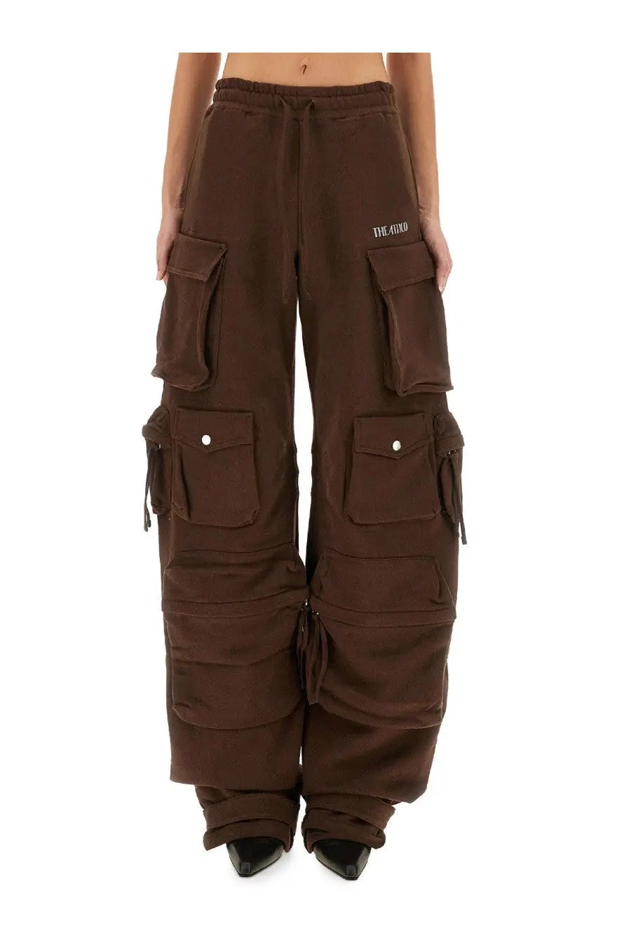 The Attico women’s long brown cargo pants with multiple pockets and a drawstring waistband featuring the avoid logo