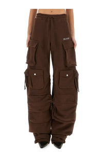 The Attico women’s long brown cargo pants with multiple pockets and a drawstring waistband featuring the avoid logo