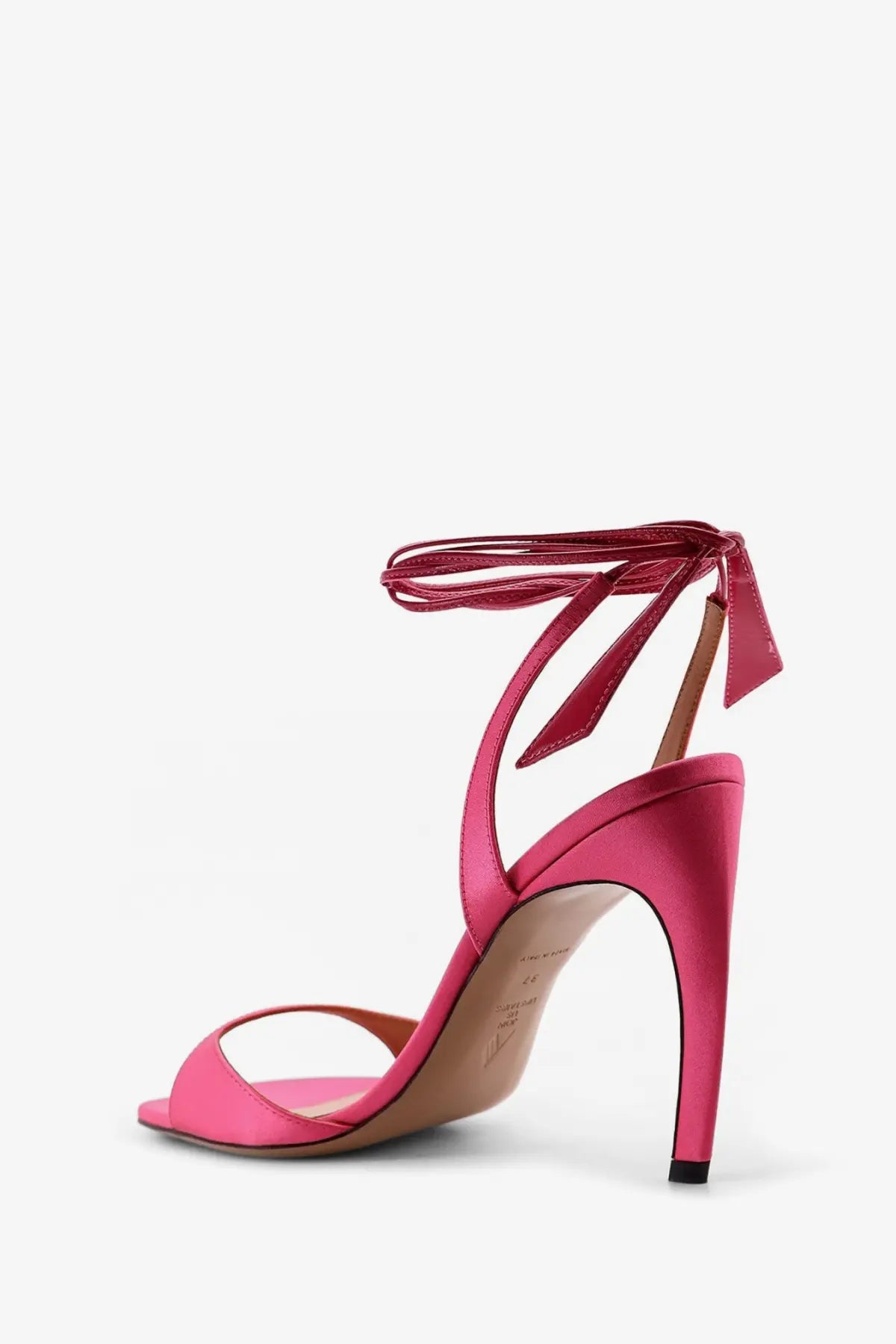 The Attico women’s Ora satin sandals pink feature a vibrant fuchsia high heel with a slender heel and ankle strap bow