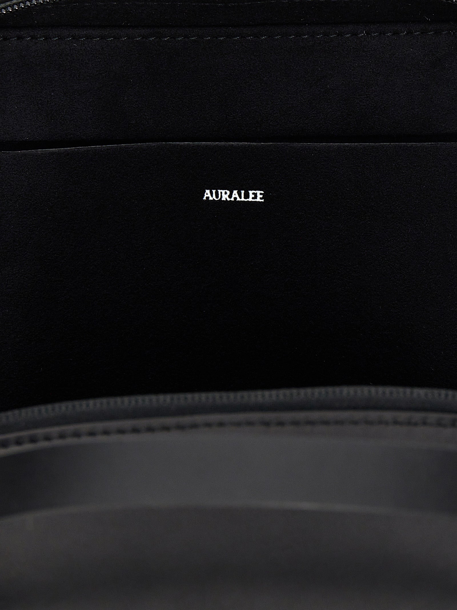 AURALEE - AURALEE - ’Leather Small Travel Case’ handbag - Women’s Bags