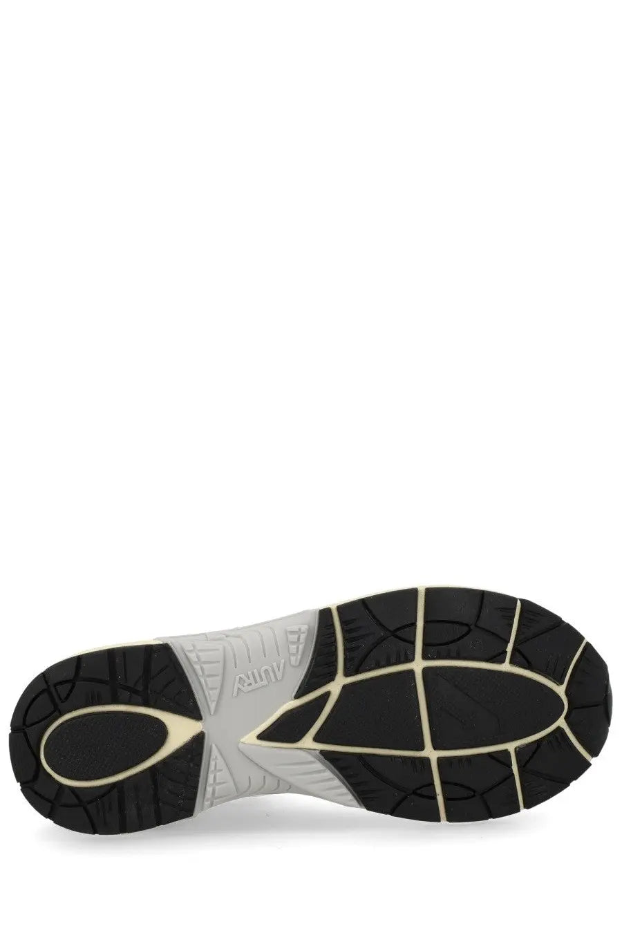 Black and white rubber sole of autry men’s hyperway sneaker with a distinctive geometric tread pattern