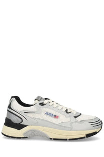 Autry men’s Hyperway sneaker white with white and gray mesh upper black accents and durable rubber sole