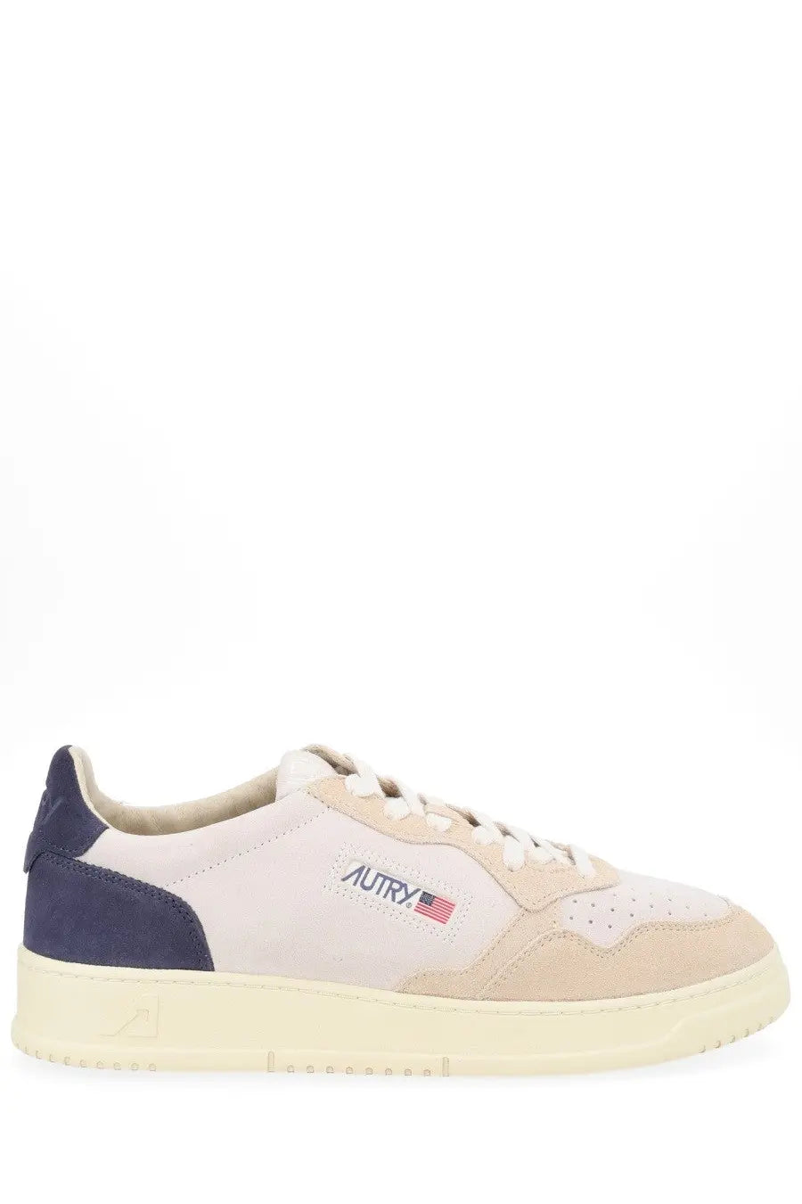 Autry men’s Medalist low sneaker in beige and navy suede with white laces and cream rubber sole featuring logo patch