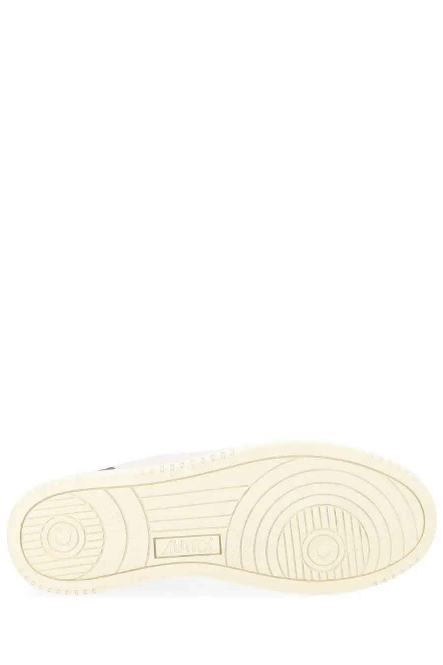 Cream-colored rubber sole with concentric circular tread and rectangular brand logo on autry men’s medalist low sneaker multicolor