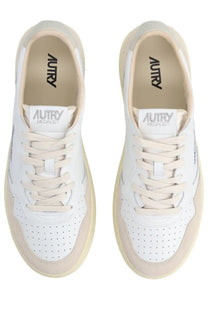 Autry men’s Medalist low sneaker in white and beige with perforated leather uppers and rubber soles