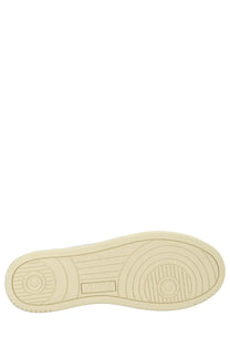 Cream-colored rubber sole with concentric circular tread patterns and rectangular brand logo on autry men’s medalist low sneaker white