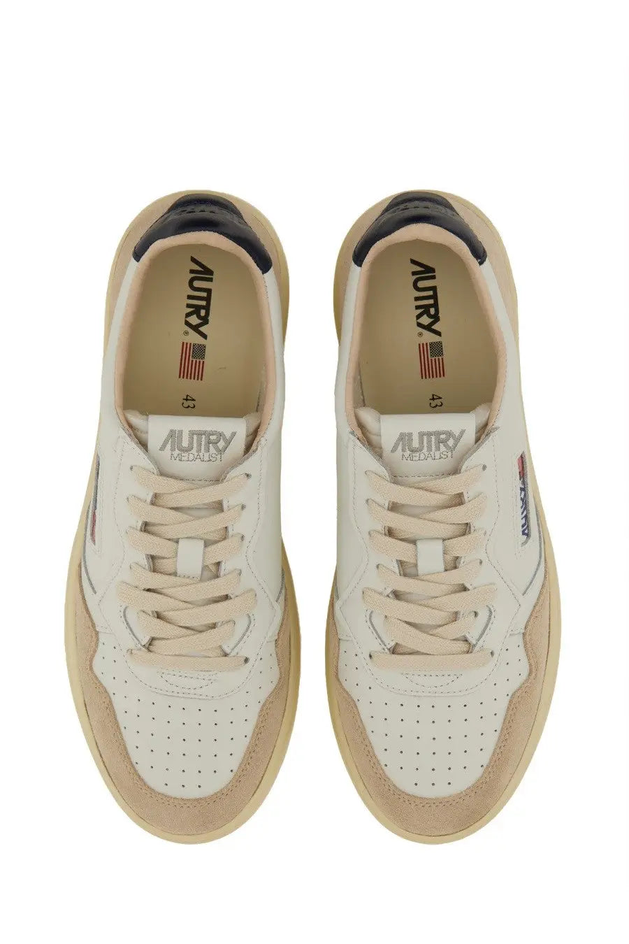 Autry men’s medalist low sneaker white in cream suede and leather with perforated toe box and black heel tab